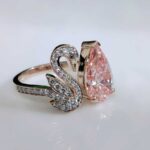 Aurora Swan: Exquisite Pink Diamond Ring with Artistic Design